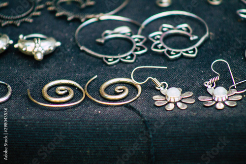 Closeup of jewelry sold in a shop in the streets of Rome