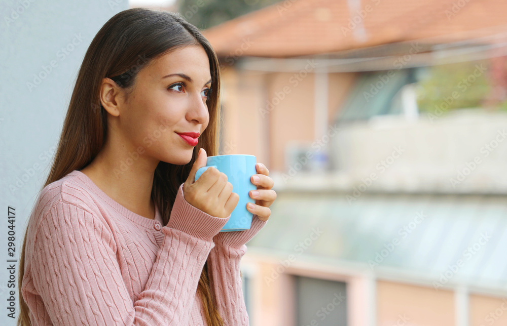 Portrait of beautiful girl enjoying hot drink in the morning, having breakfast outdoors. Portrait of beautiful girl enjoying hot drink in the morning, having breakfast outdoors.