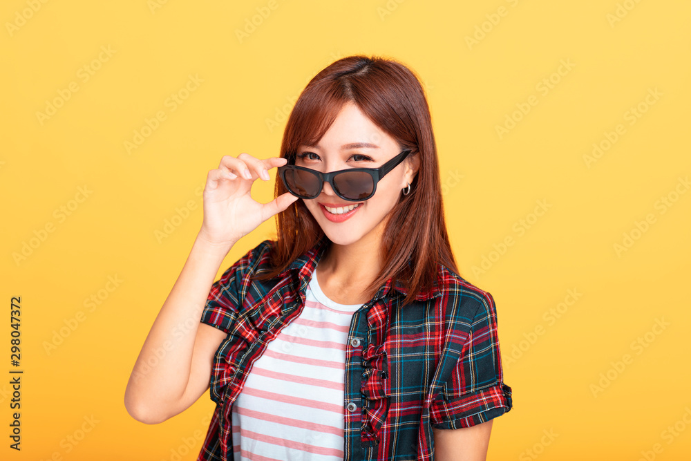 Portrait of smiling beautiful woman in sunglasses Portrait of smiling beautiful woman in sunglasses
