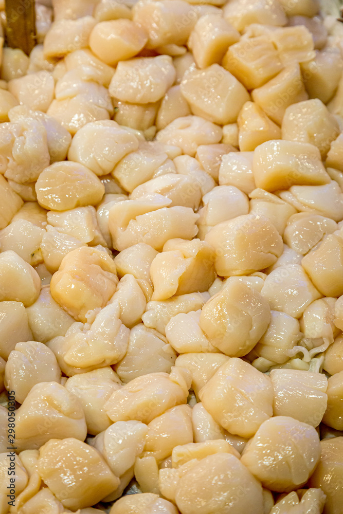 A full frame photograph of scallops for sale on a market stall A full frame photograph of scallops for sale on a market stall