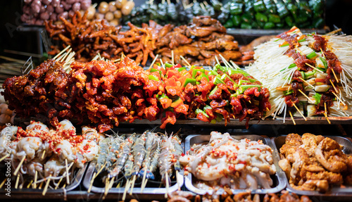 BBQ raw and other beef, pork BBQ at Street food in Vietnam market 