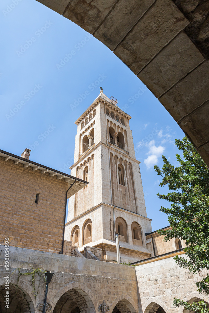 View from the courtyard to the bell tower of the Lutheran Church of the Redeemer on Muristan street in the Old City in Jerusalem, Israel