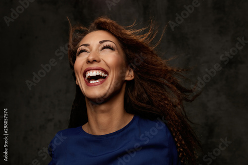 Beautiful woman laughing and having fun.