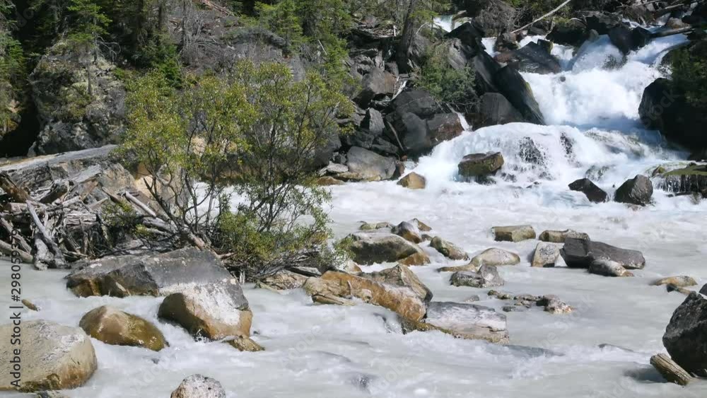 waterfall in yoho valley river in summer daytime in Yoho National Park, British Columbia,Canada in summer daytime waterfall in yoho valley river in summer daytime in Yoho National Park, British Columbia,Canada in summer daytime