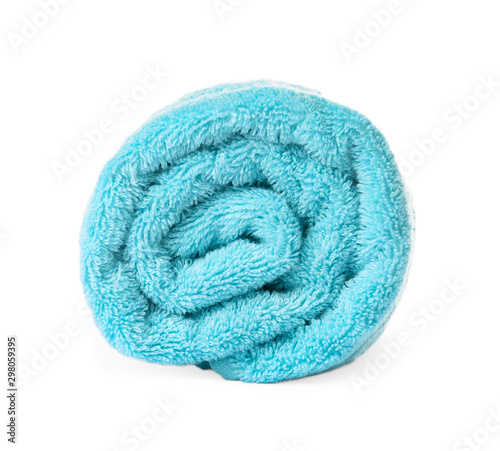Rolled clean turquoise towel on white background