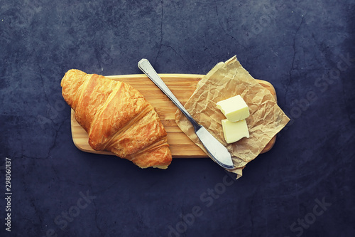 Fresh pastries on the table. French flavored croissant.
