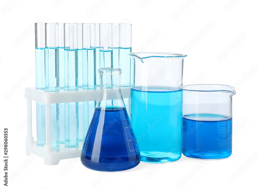 Laboratory glassware with blue liquids isolated on white Laboratory glassware with blue liquids isolated on white