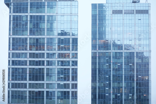 Buildings made of glass and concrete. Skyscrapers in the city.