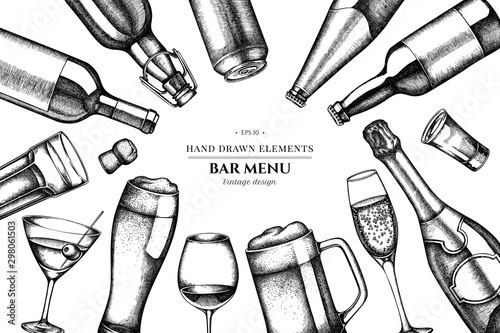 Floral design with black and white glass, champagne, mug of beer, alcohol shot, bottles of beer, bottle of wine, glass of champagne, glass of wine, glass of martini, aluminum can