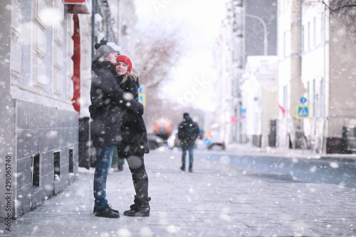 Young couple walking throug...