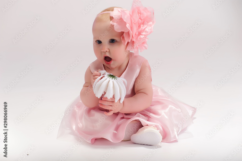 Fototapeta premium Little girl in pink dress