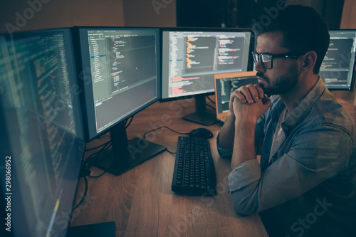 Photography Photo of serious coder interested in critical errors failures arising remaining