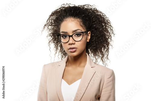 Businesswoman. African American Woman in business or teacher on a white background. Girl in a strict suit and glasses.