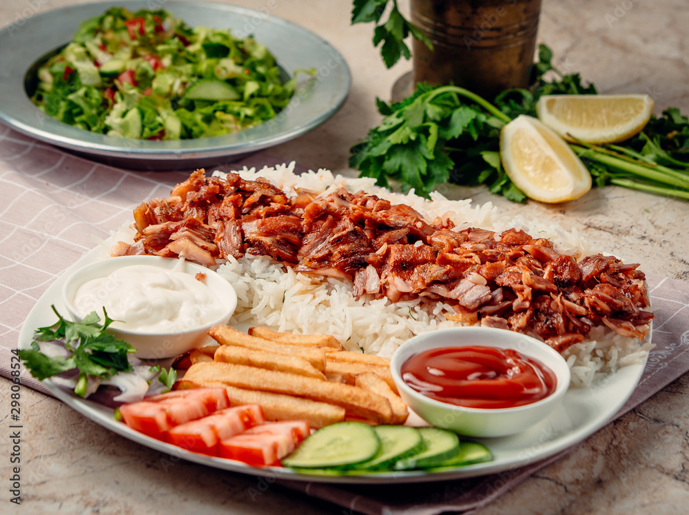 iskender kebab with rice and vegetables iskender kebab with rice and vegetables