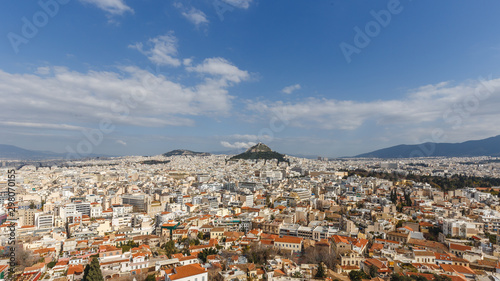 Athens cityscape, and Lycabettus Hill with blue sky © Sen