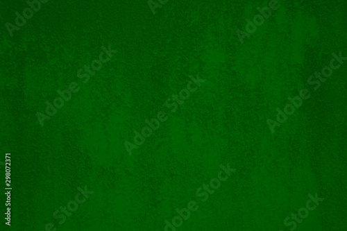 Dark green rough grunge damage wall distress background texture