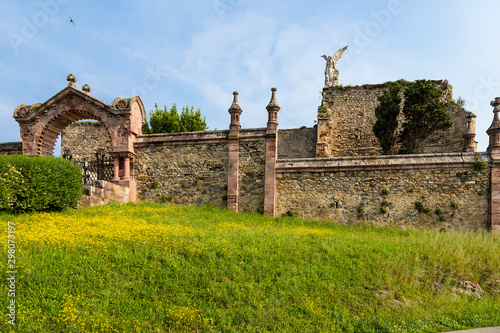 Comillas, Spain. Gate and fence of the town cemetery photo