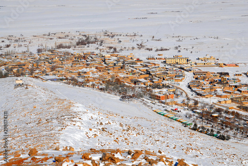 Snowy winter in Iran. View at Ali Sadr village (outskirts of Hamadan). photo