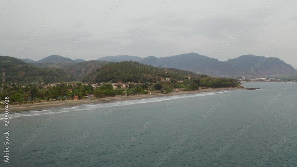 Aerial 4K drone flying over Tropical Beach of Pelabuhan Ratu in Suka Bumi, West Java, Indonesia. Drone Videos on tropical beach Aerial 4K drone flying over Tropical Beach of Pelabuhan Ratu in Suka Bumi, West Java, Indonesia. Drone Videos on tropical beach
