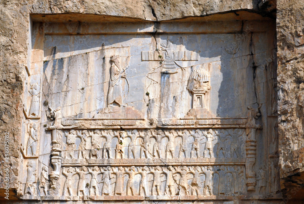 Sassanian stone reliefs in Naqsh-e Rostam (rock tombs of ancient iranian kings Darius III, Artaxerxes I, Darius I and Xerxes I). Iran. Sassanian stone reliefs in Naqsh-e Rostam (rock tombs of ancient iranian kings Darius III, Artaxerxes I, Darius I and Xerxes I). Iran.
