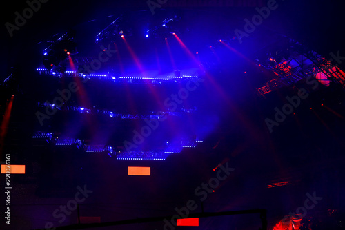 Blue light on a rock concert stage as background © schankz