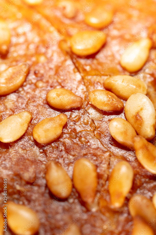 Sesame seeds on a brown crust of bread Sesame seeds on a brown crust of bread