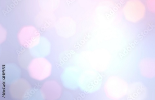 Holiday garland lights pattern. Bright bokeh background. Blue pink white gradient blurred texture.