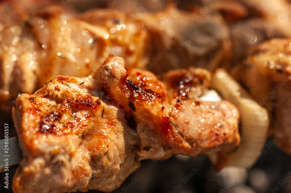 Tasty and delicious pork meat are grilled on the grill