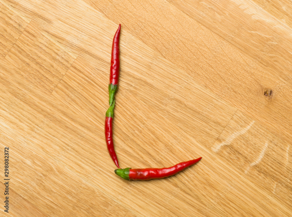 Food letters made from freshly picked chilli peppers Food letters made from freshly picked chilli peppers