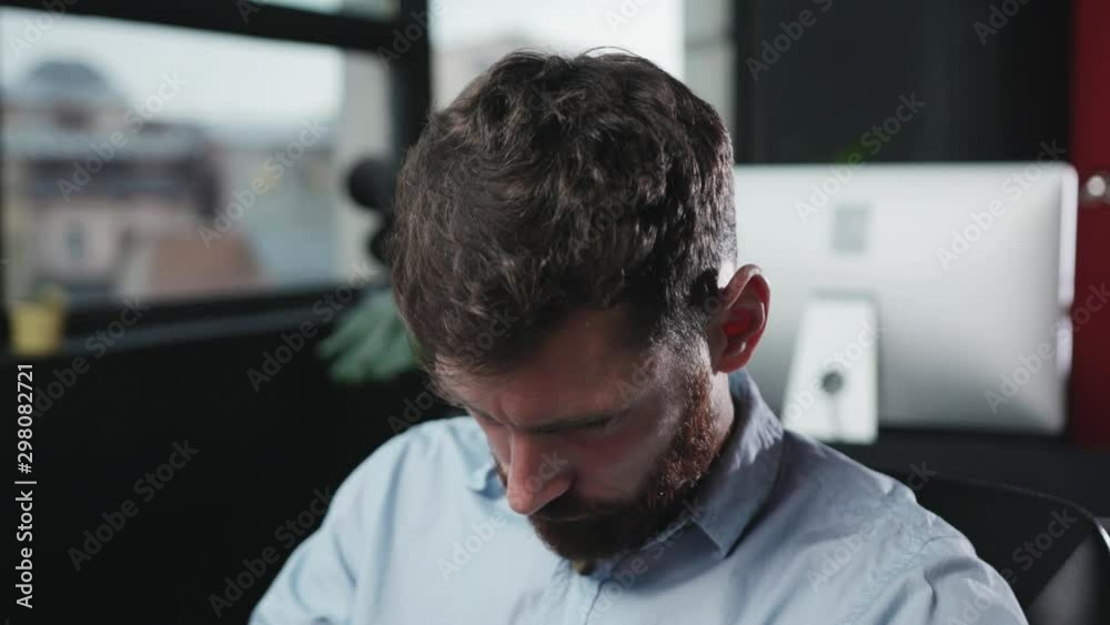 Close-up young man hands keyboarding on modern computer. Drunk fun office manager trying to work concentrate sitting at working desk in office. Close-up young man hands keyboarding on modern computer. Drunk fun office manager trying to work concentrate sitting at working desk in office.