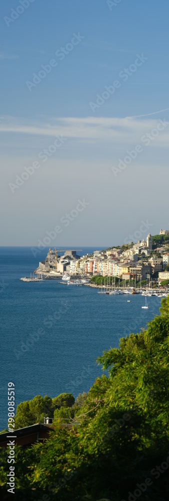 Panorama from the top of Portovenere, near the Cinque Terre, at sunrise light. The bay with the marina, the fort, the church of San Pietro.