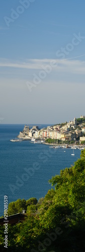 Panorama from the top of Portovenere, near the Cinque Terre, at sunrise light. The bay with the marina, the fort, the church of San Pietro.