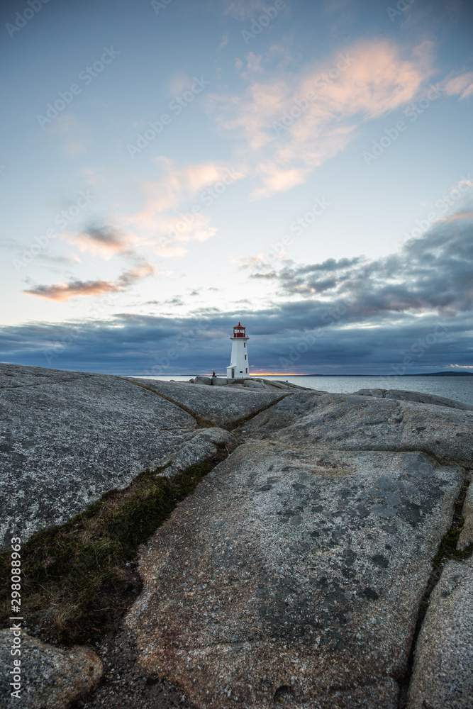 The lightouse Peggys cove in Nova scotia during the sunset