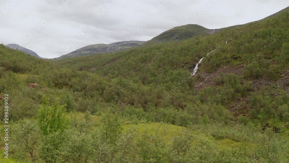 Drone shot of Norway remote rocky landscape with lakes, forests and rivers Drone shot of Norway remote rocky landscape with lakes, forests and rivers
