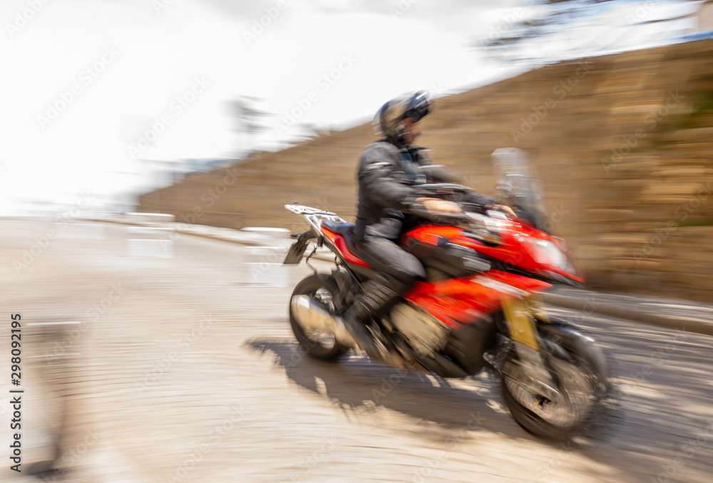 Fototapeta premium Biker, motorcyclist, moto, bike, motorcycle, speed, blur, blurry, movement, red, man