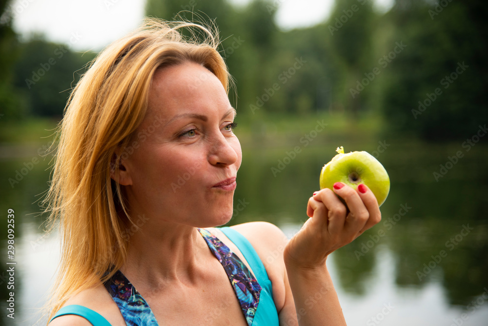 Beautiful girl eating green Apple Beautiful girl eating green Apple