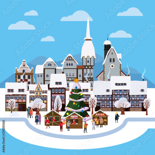Christmas urban winter city street with old town houses and trees