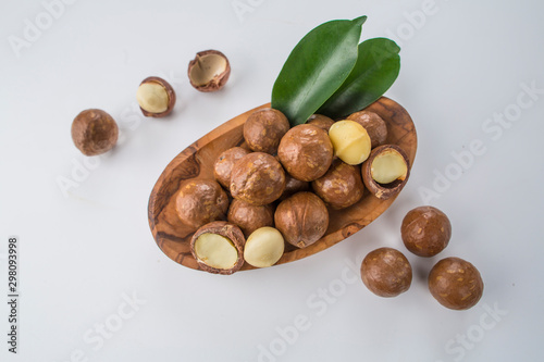 Organic macadamia nut on white background