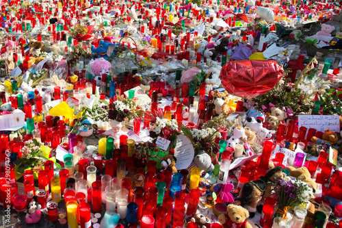 A lot of of candles, toys and flowers on Las Ramblas street in memory of victims of terrorists attack in Barcelona 2017. photo