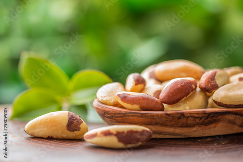 Bertholletia.Brazil nuts on wooden texture