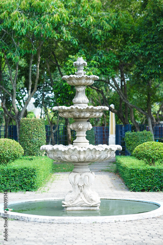 Vintage fountain. An old vintage park fountain in the outfoor garden.