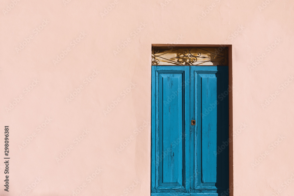 Pink house with blue door, detail