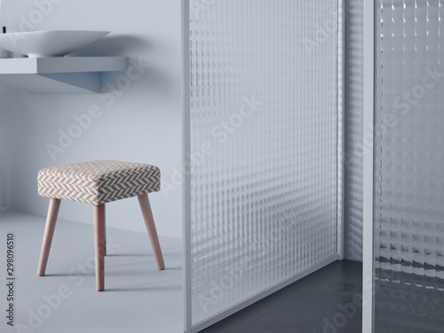 Small trendy stool located in middle of modern simple room with white wall and partition