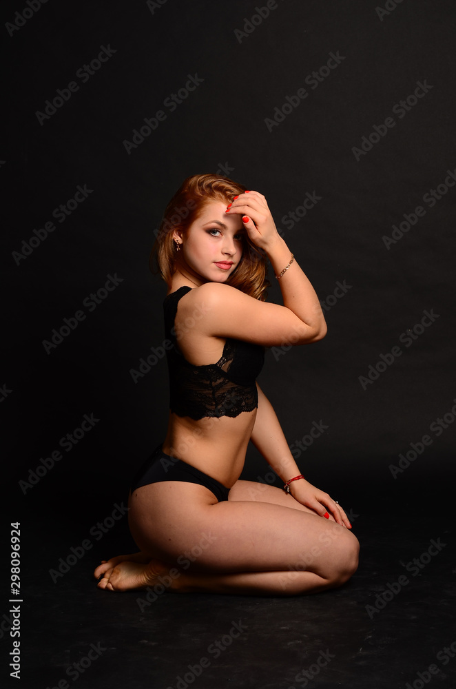 Fototapeta premium Young beautiful woman in a fashionable linen luxury blonde in the Studio.