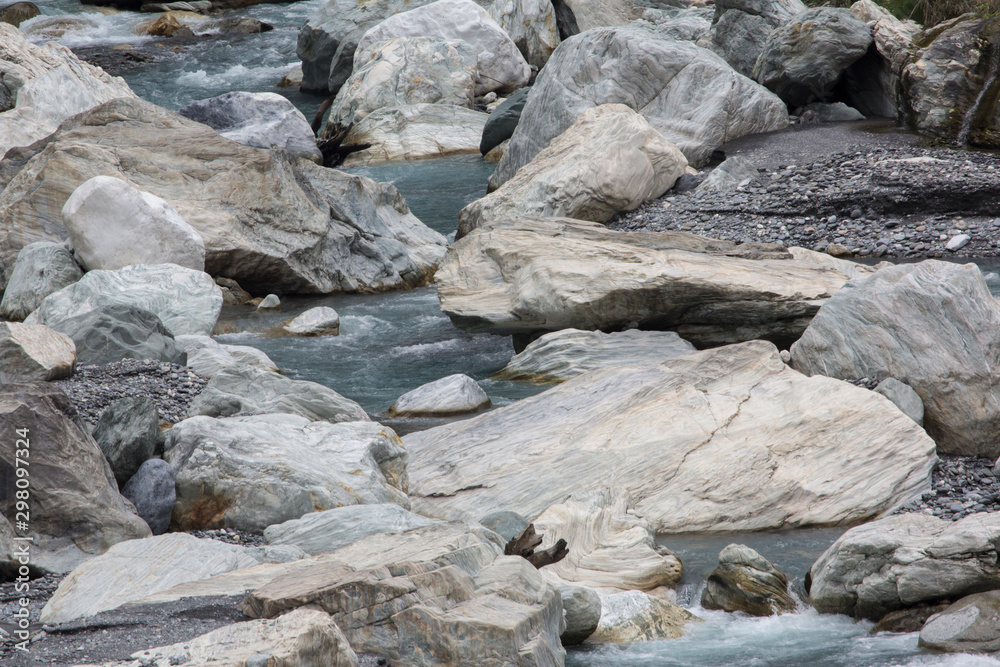 Taroko Gorge is an impressive 19-km-long canyon, situated near Taiwan's east coast. The area of the gorge is also identified as Taroko Gorge National Park. The upward thrust of hard rock, combined wit Taroko Gorge is an impressive 19-km-long canyon, situated near Taiwan's east coast. The area of the gorge is also identified as Taroko Gorge National Park. The upward thrust of hard rock, combined wit