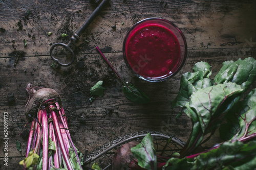 Beetroot and fresh smoothie on wooden table