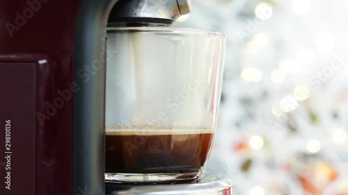 Home Espresso Coffee Machine Filling And Steaming Up Glass Cup Bokeh Lights In Background Time Lapse