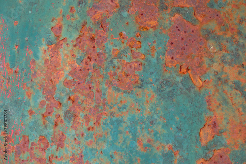 Peeling paint on the rust wall. Empty for design, pattern, cover, overlay texture, background and other, Surface of old steel background. © Ammak