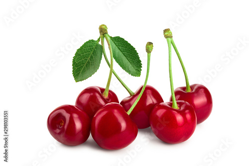 Some cherries with leaf closeup isolated on white background