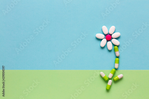 Pills in the shape of flowers photo